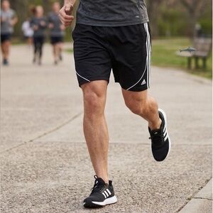 ADIDAS Men’s Black Athletic Shorts with White Stripe Detailing. Size L